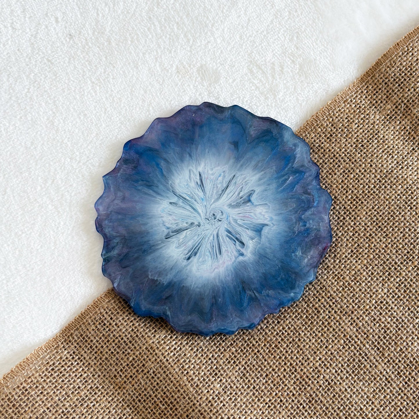 Unique round resin coaster with blue and purple marble pattern, handmade décor gift