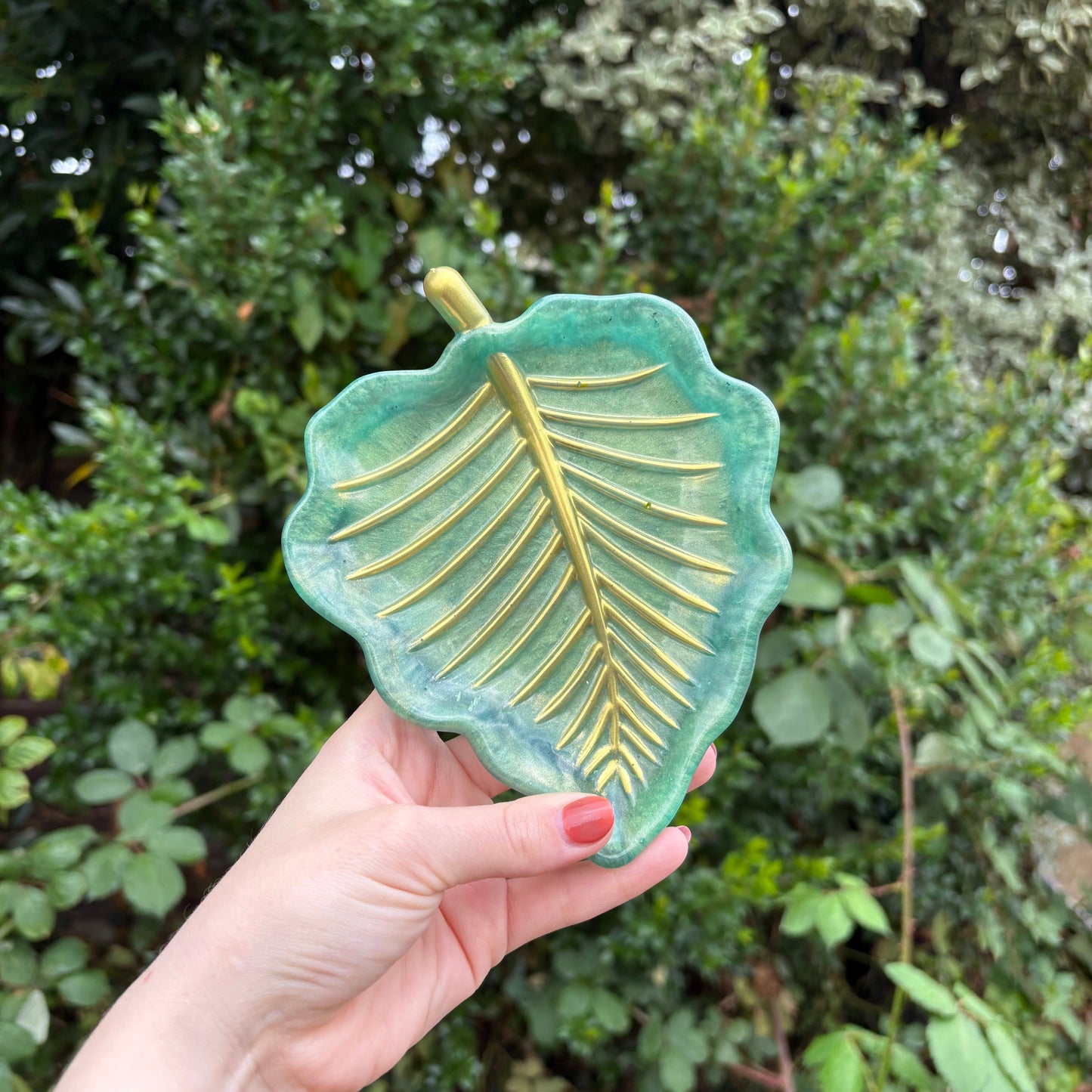 Handmade green resin jewellery holder with gold leaf