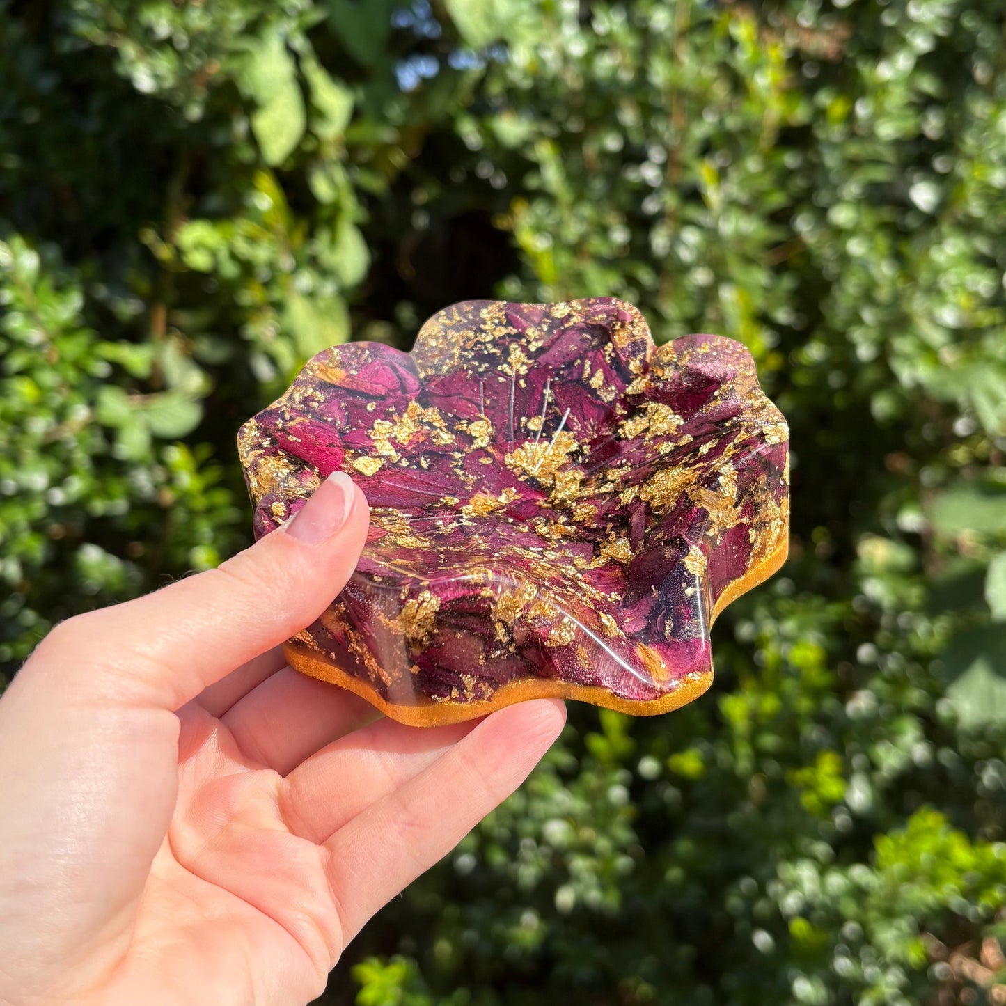 Burgundy resin soap dish with leaf detailing and drainage holes