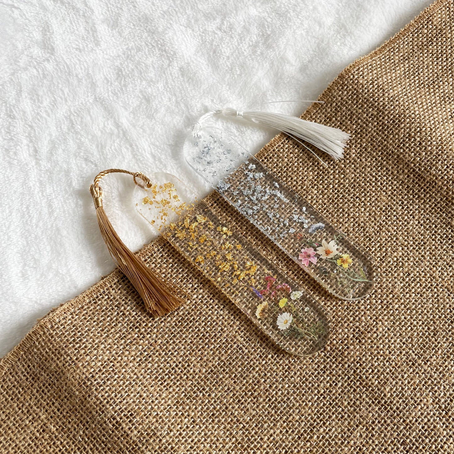 Handmade resin bookmark, clear floral design with gold and silver shimmer