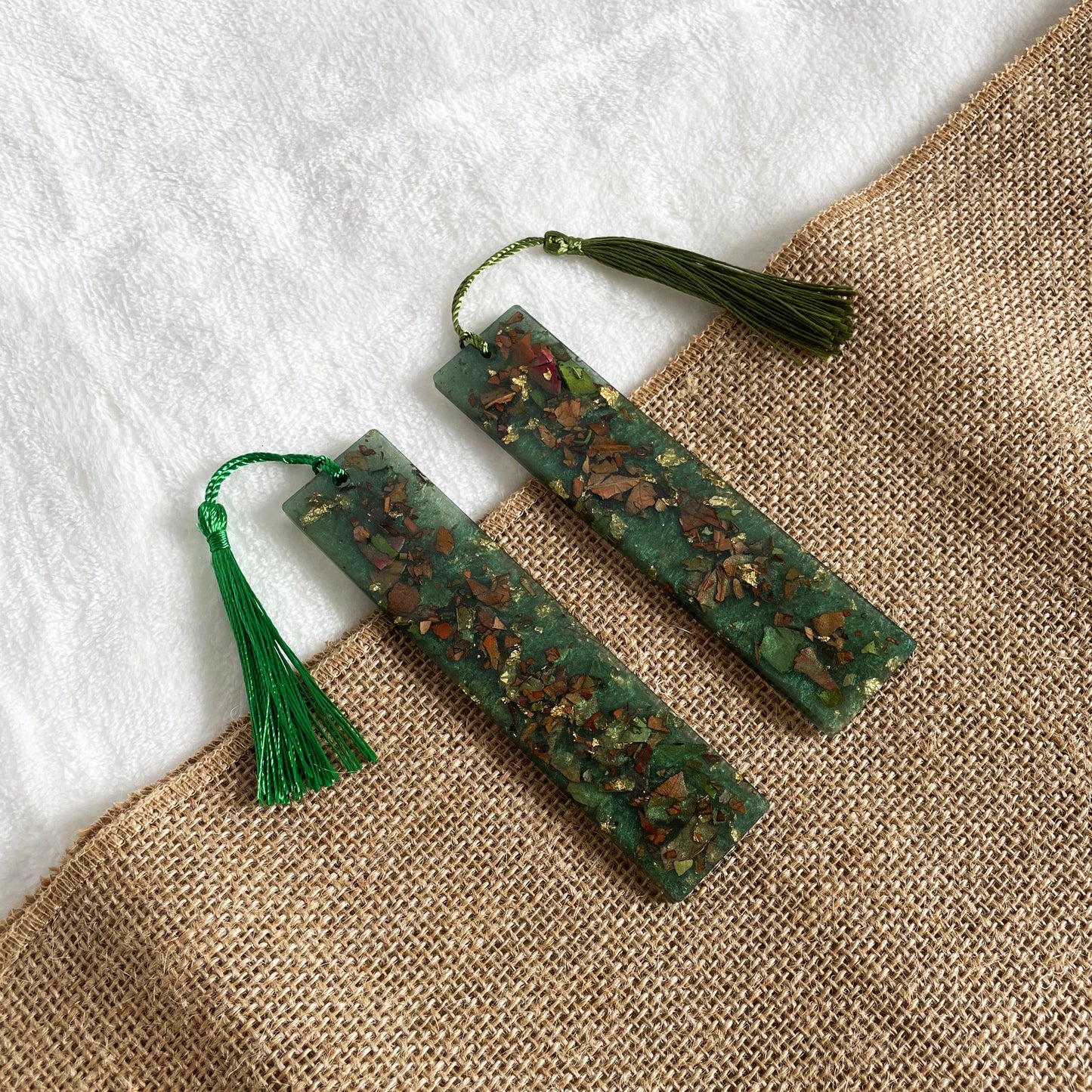 Handmade teal resin bookmark with real rose petals
