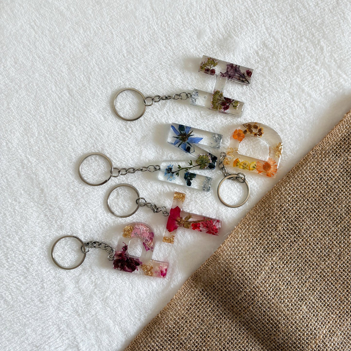 Personalised floral resin keyring, transparent letter design