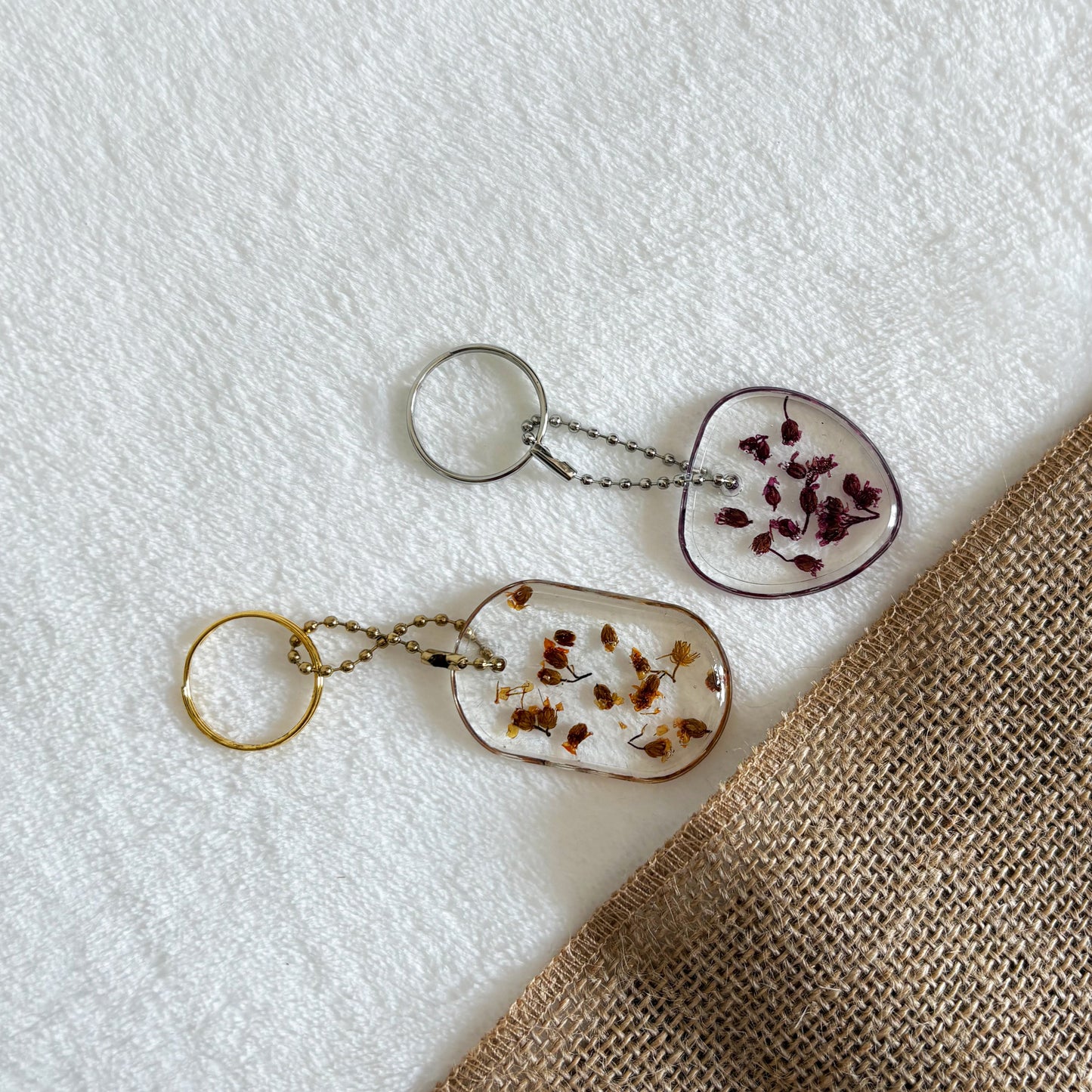 Heart shaped resin keyring with pressed flowers, handmade design