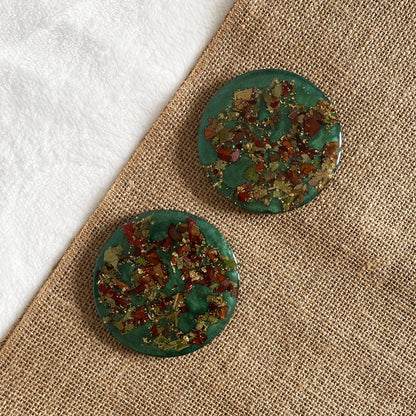 Artisan resin coaster with teal base and rose petals, durable handmade table décor