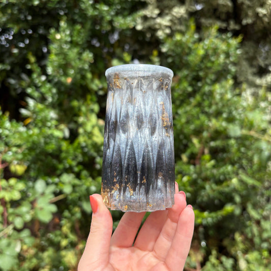 Handmade black and silver marble resin vase with textured surface