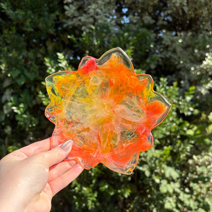 Handmade resin tealight holder with sunset marbling