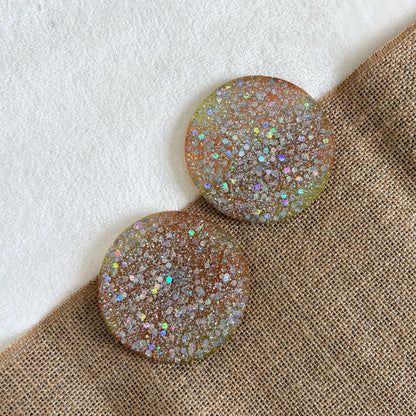 Silver glitter resin coaster, yellow and orange tones, handmade round home accessory