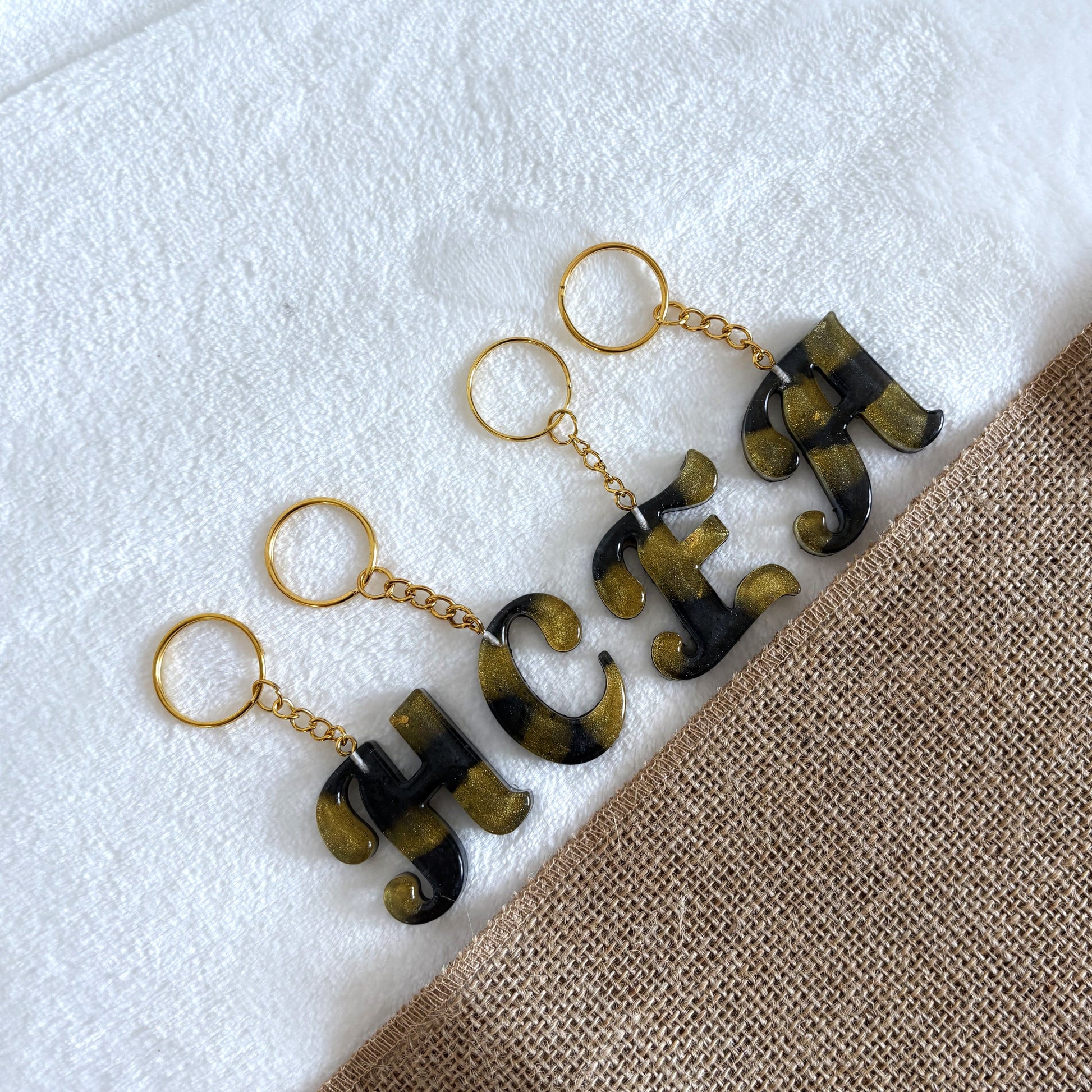 Personalised resin letter keychain, black and gold handmade accessory