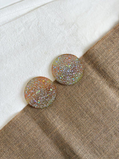 Handmade silver resin glitter coaster with yellow and orange base, round shape, handmade home décor