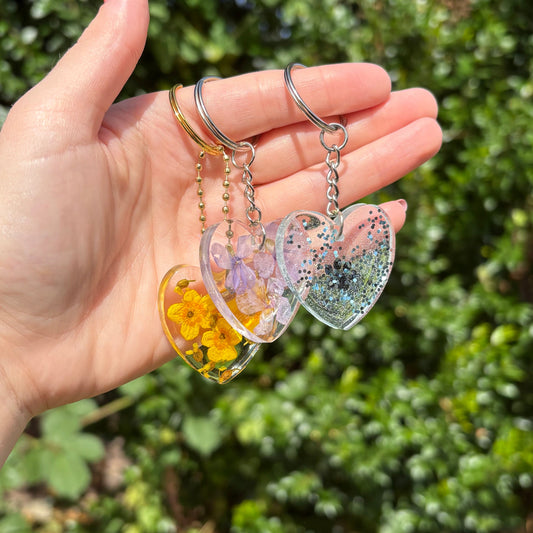 Transparent floral heart handmade resin keyring with yellow flowers