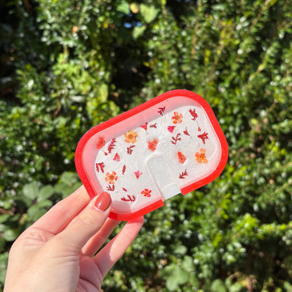 Handmade white resin soap dish with red edge and floral detailing